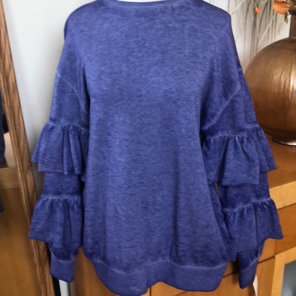 Beautiful sweater tight blouse with ruffle